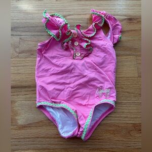 Pink Ruffled Swimsuit with Green Trim